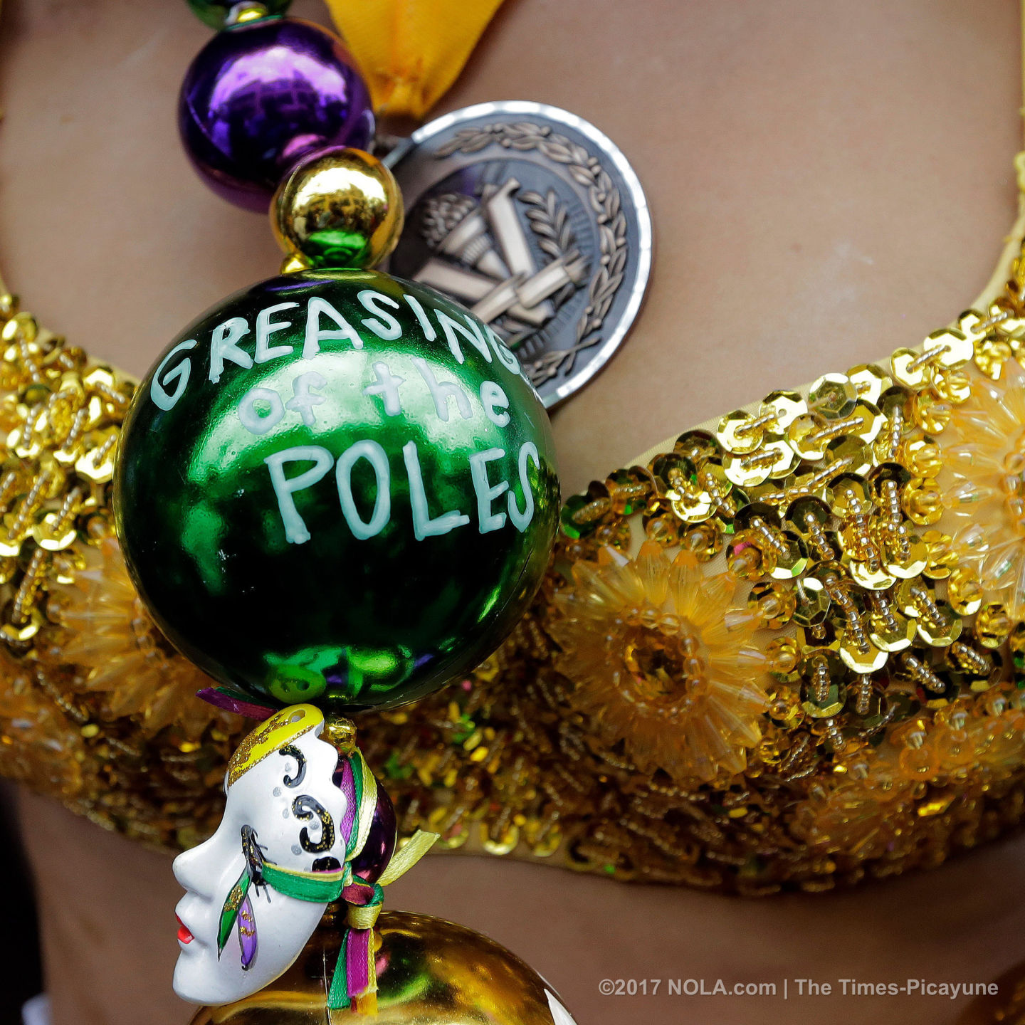 Only on Bourbon Street: Greasing of the Poles for Mardi Gras